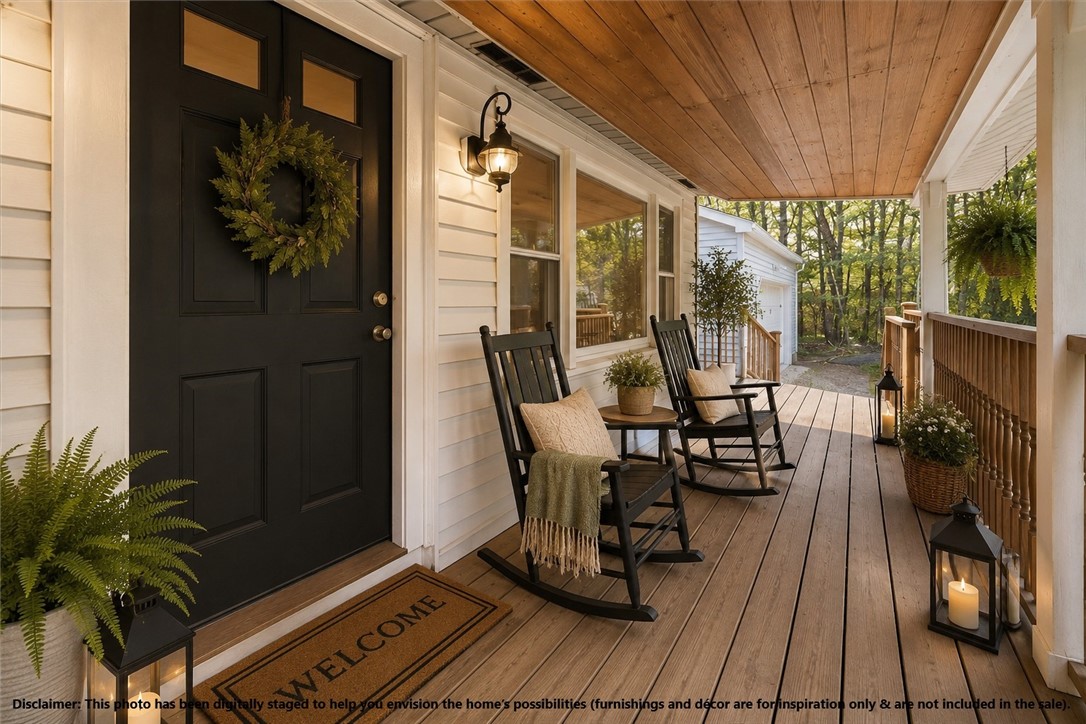 322 Rocky Hill Road Scituate, RI 02857 - Photo 5 of 50 Shown digitally staged to showcase this home's possibilities! Iconic New England farmer’s porch sets the tone for this home—an inviting space to unwind with morning coffee, host summer evenings, or simply enjoy the neighborhood charm.