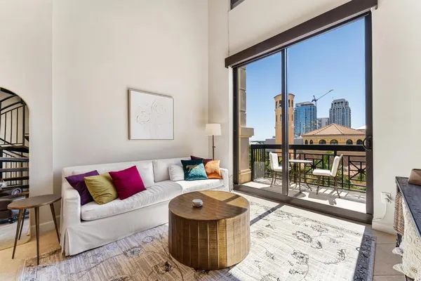 a living room with furniture and a couch