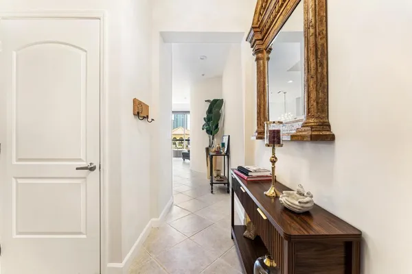 a kitchen with a sink cabinets and stainless steel appliances