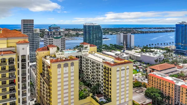 a view of a city with tall buildings