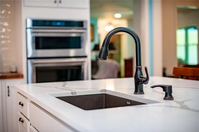 a spacious bedroom with a bed window and a walk in closet