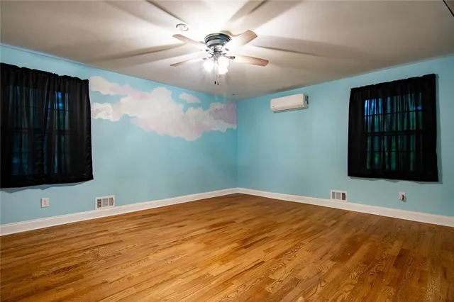 an empty room with windows