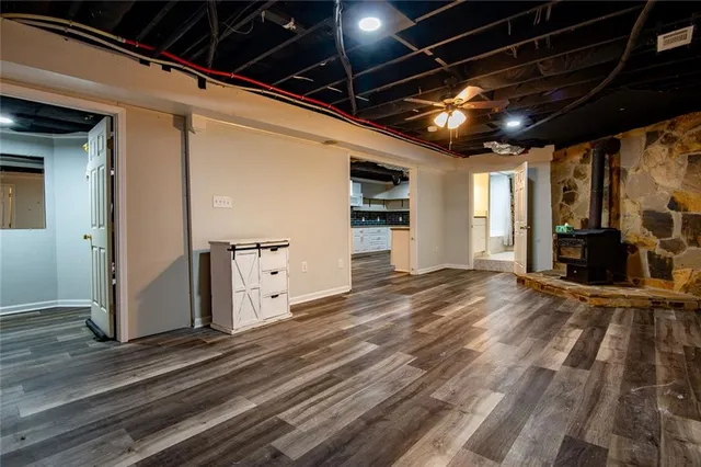 a front view of a house with a yard and fountain