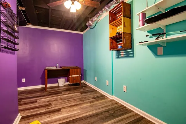 a view of a house with a backyard