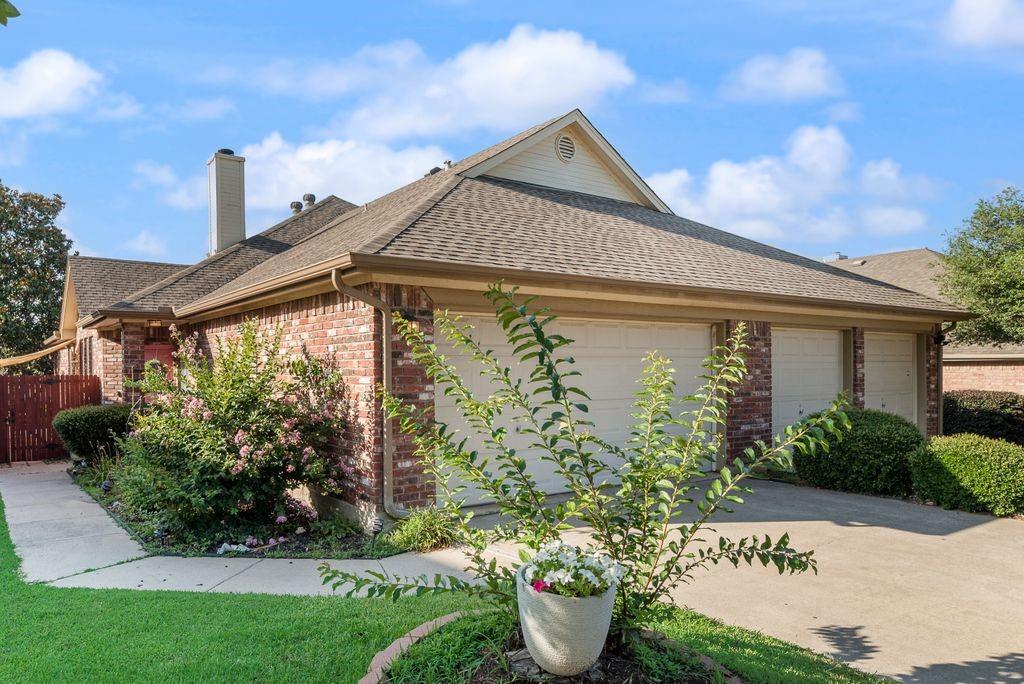 3205 Cape Cod Court Arlington, TX 76017 - Photo 1 of 30 a front view of a house with garden