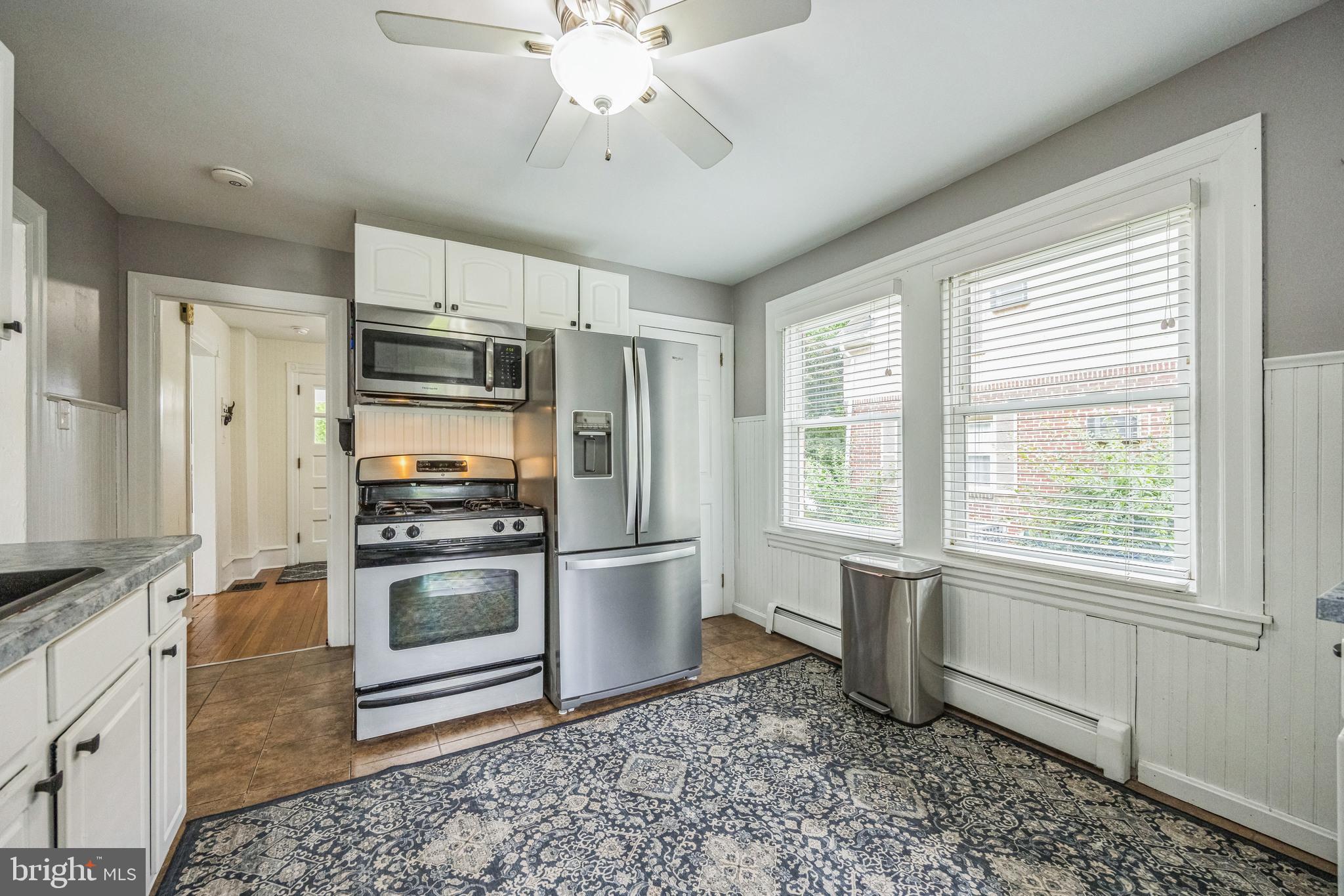 665 U Street King of Prussia, PA 19406 - Photo 12 of 26 a kitchen with stainless steel appliances granite countertop a stove a refrigerator and a sink