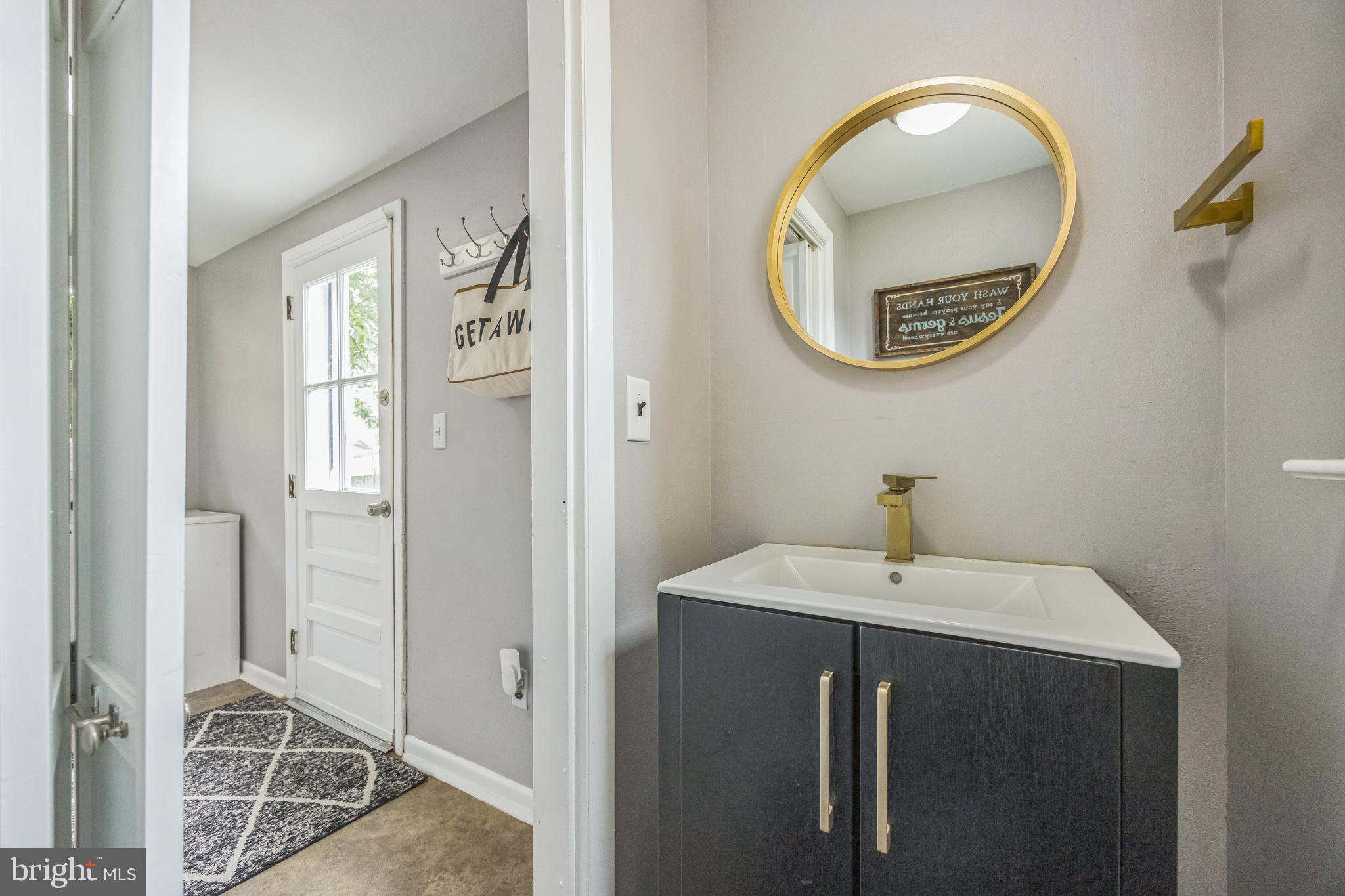 665 U Street King of Prussia, PA 19406 - Photo 14 of 26 a bathroom with a sink and a mirror