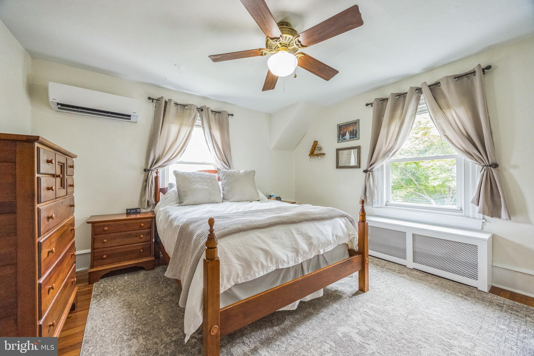 665 U Street King of Prussia, PA 19406 - Photo 15 of 26 a bedroom with a bed and a large window