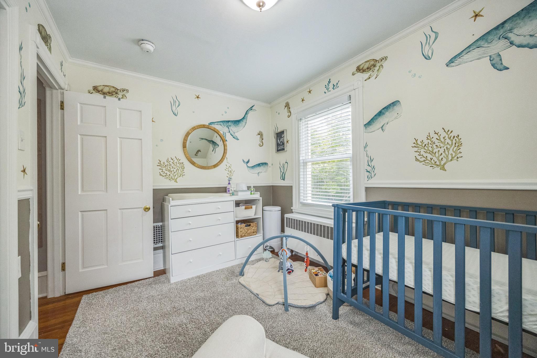 665 U Street King of Prussia, PA 19406 - Photo 20 of 26 a bedroom with furniture a window and a chandelier