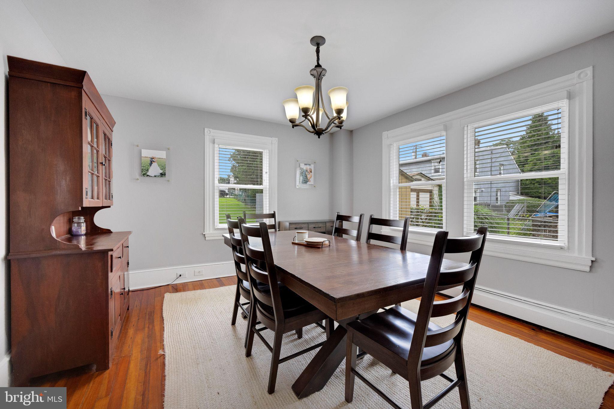 665 U Street King of Prussia, PA 19406 - Photo 8 of 26 a view of a dining room with furniture window and wooden floor