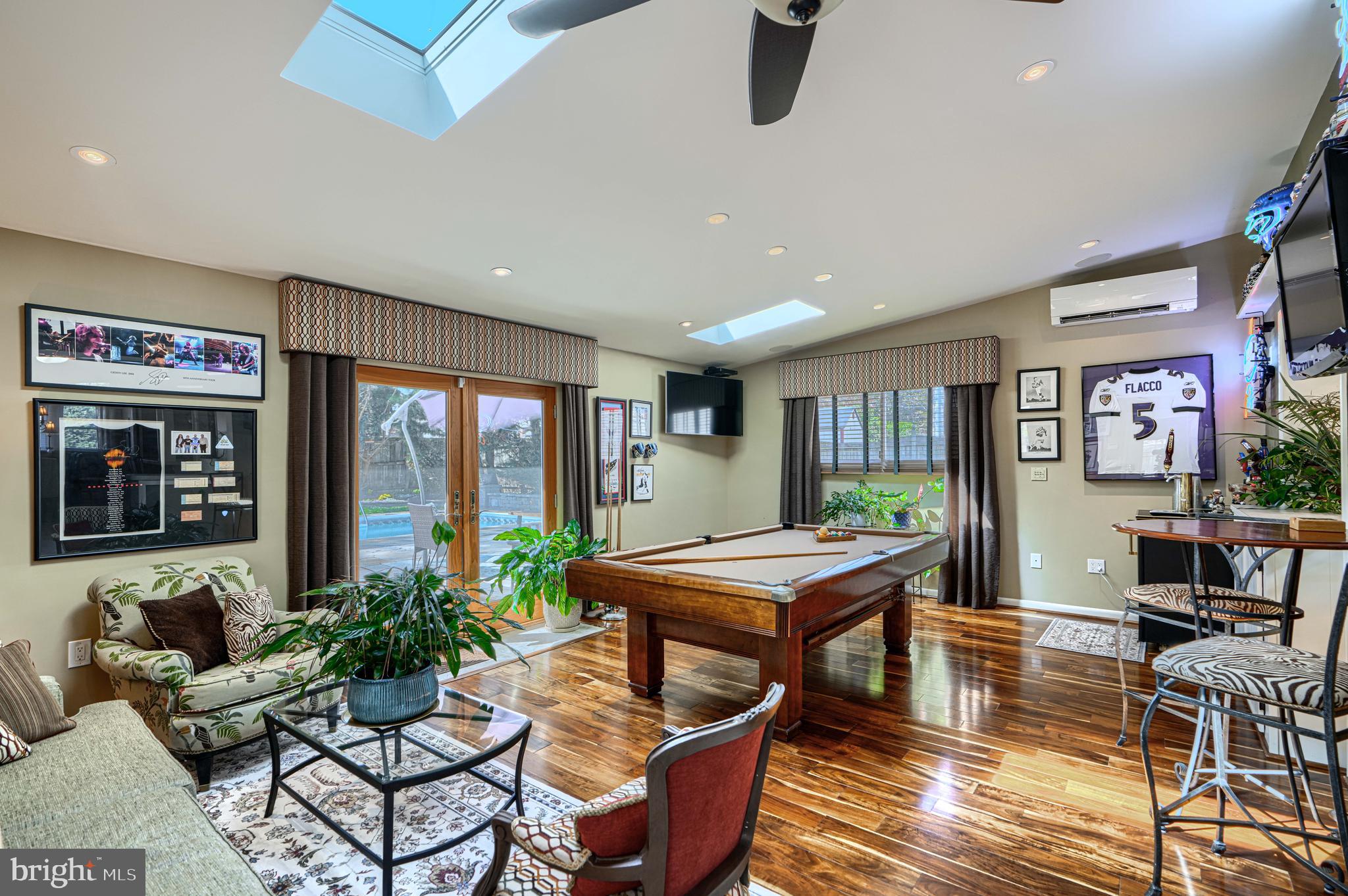 2118 Eastridge Road Lutherville-Timonium, MD 21093 - Photo 19 of 49 a dining room with furniture window and wooden floor