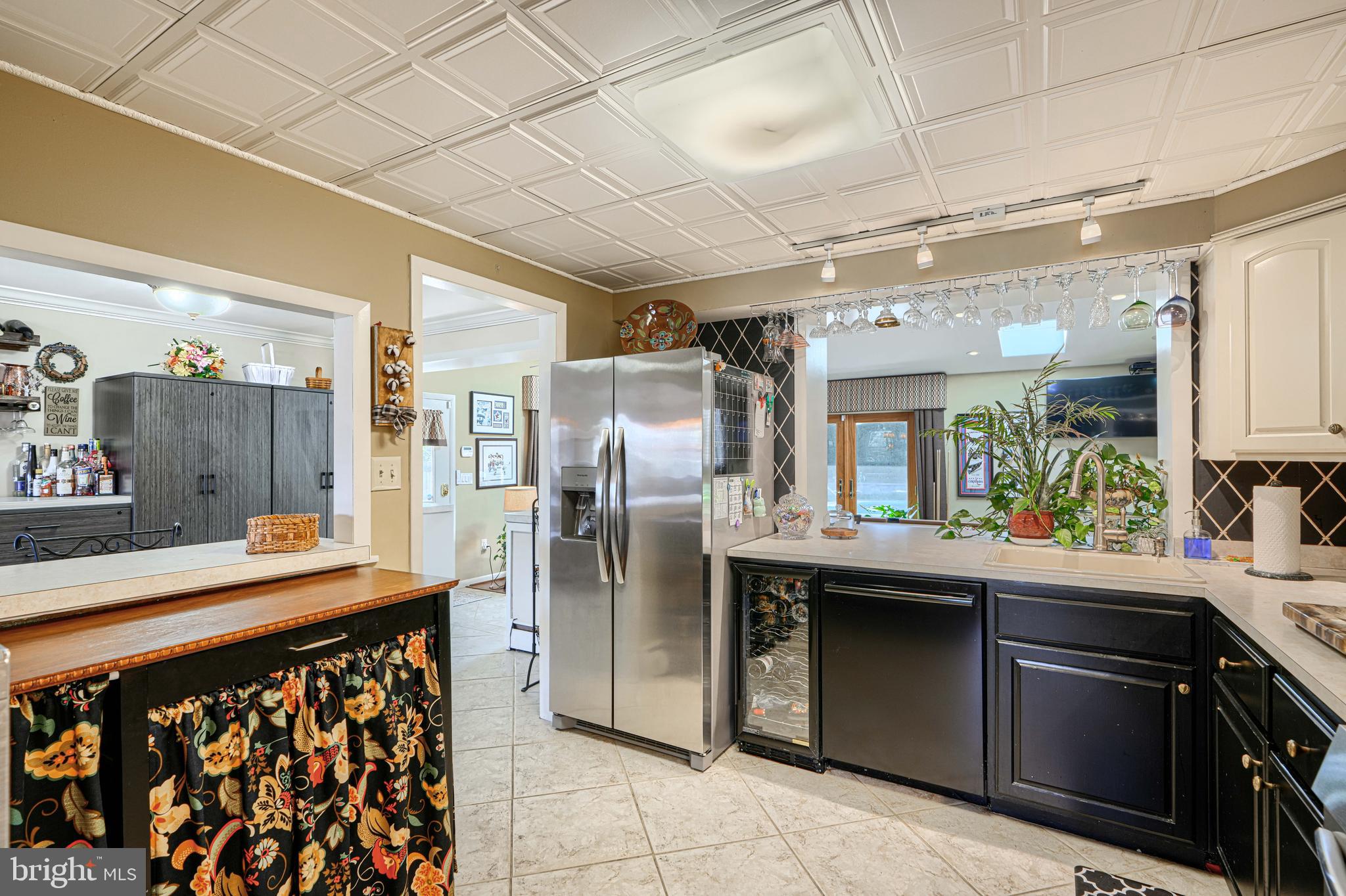 2118 Eastridge Road Lutherville-Timonium, MD 21093 - Photo 21 of 49 a kitchen with stainless steel appliances granite countertop a sink and a refrigerator