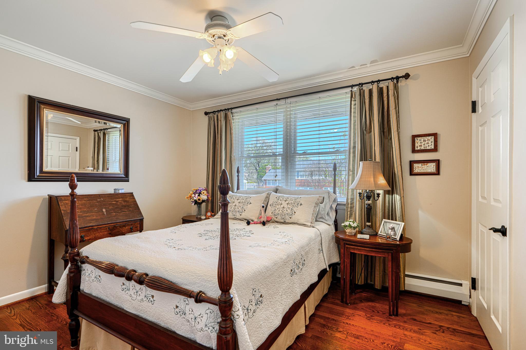 2118 Eastridge Road Lutherville-Timonium, MD 21093 - Photo 30 of 49 a bedroom with a bed and a table
