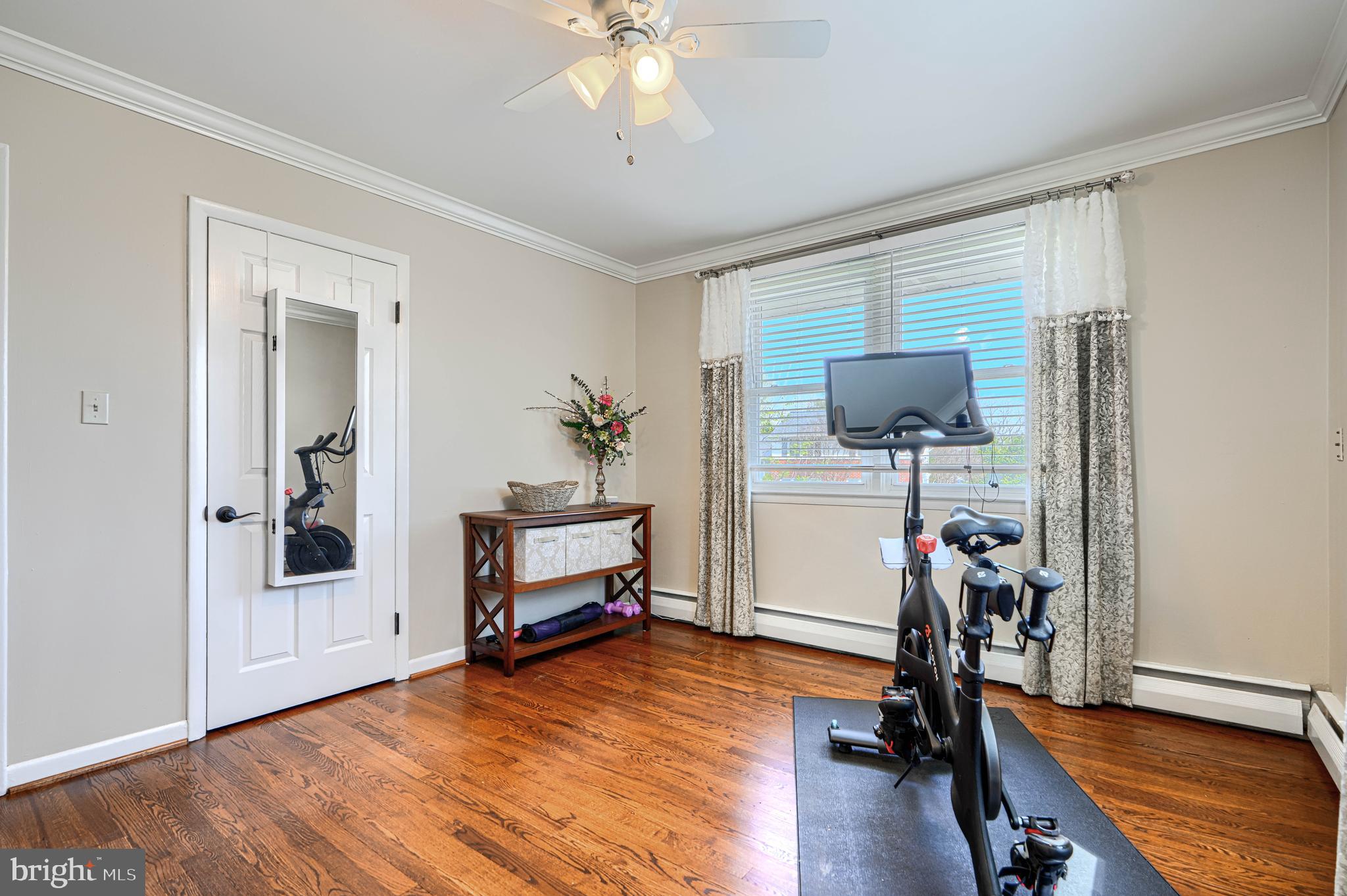 2118 Eastridge Road Lutherville-Timonium, MD 21093 - Photo 33 of 49 a view of a workspace with furniture and a bedroom