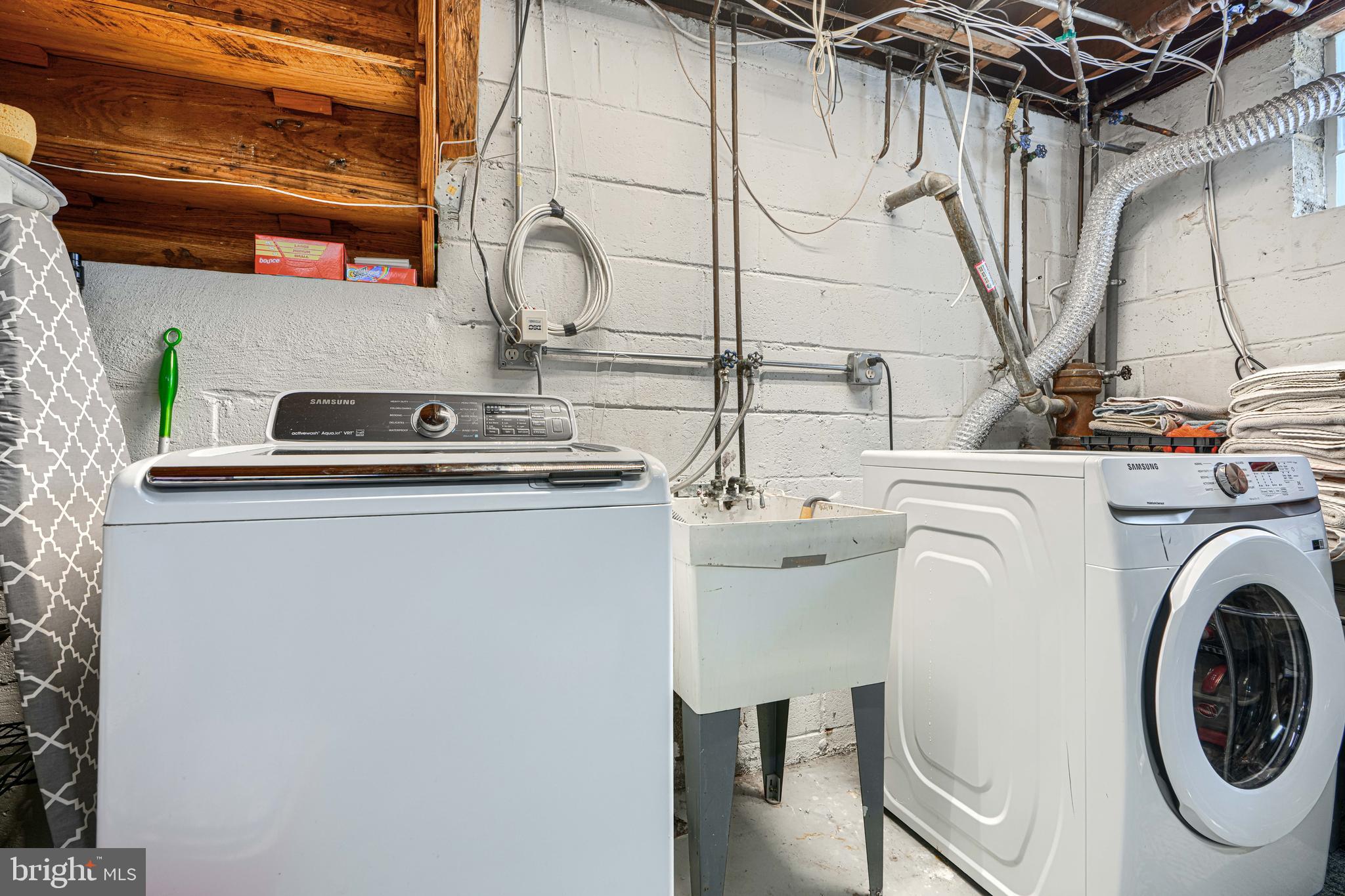 2118 Eastridge Road Lutherville-Timonium, MD 21093 - Photo 37 of 49 a utility room with dryer and washer