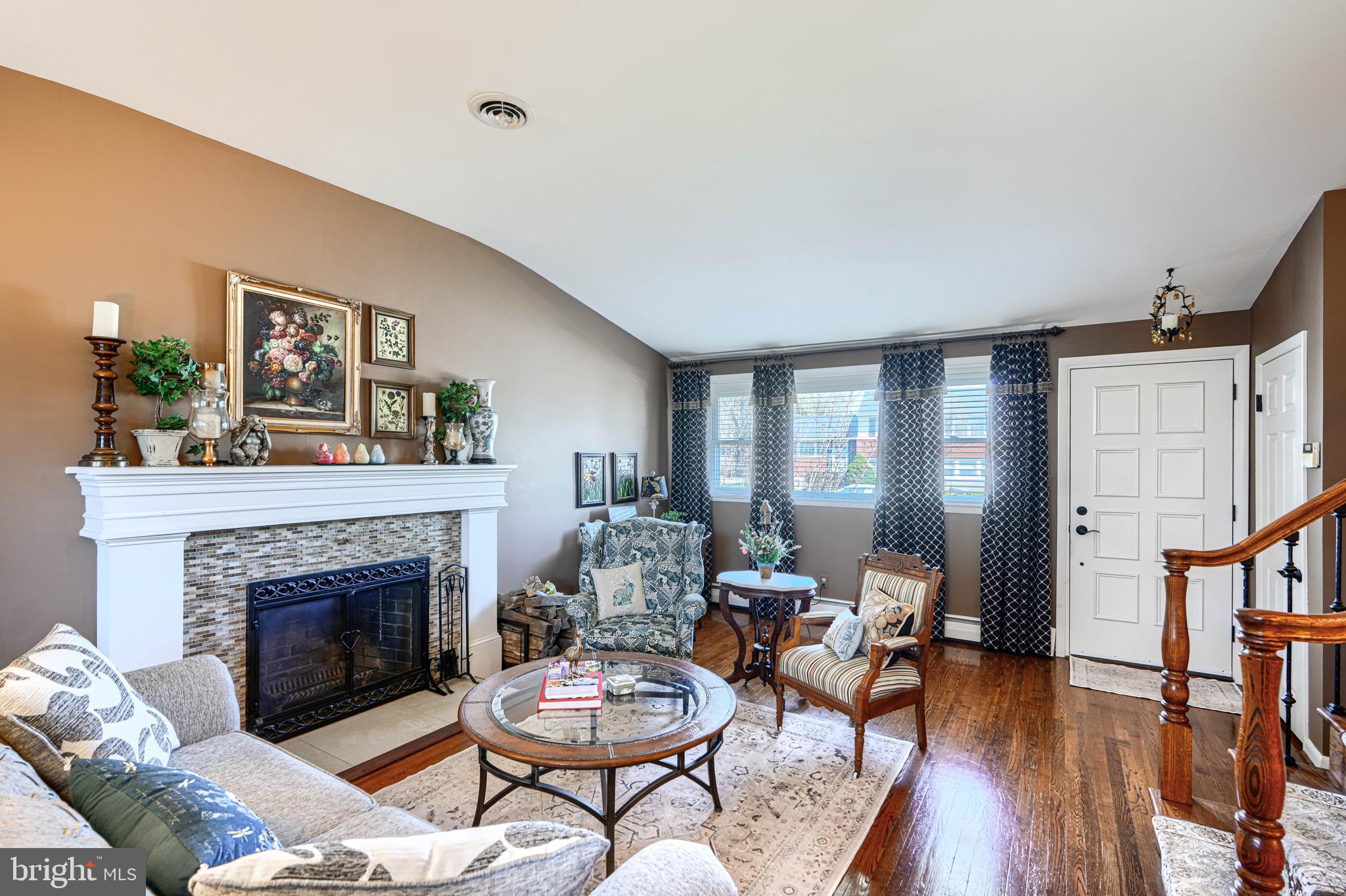 2118 Eastridge Road Lutherville-Timonium, MD 21093 - Photo 5 of 49 a living room with furniture and a fireplace