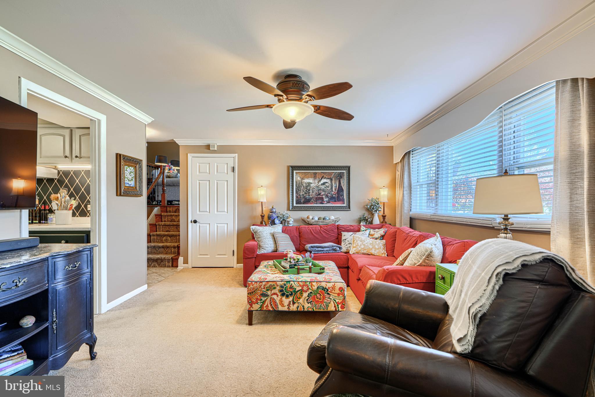 2118 Eastridge Road Lutherville-Timonium, MD 21093 - Photo 9 of 49 a bedroom with furniture and a fireplace