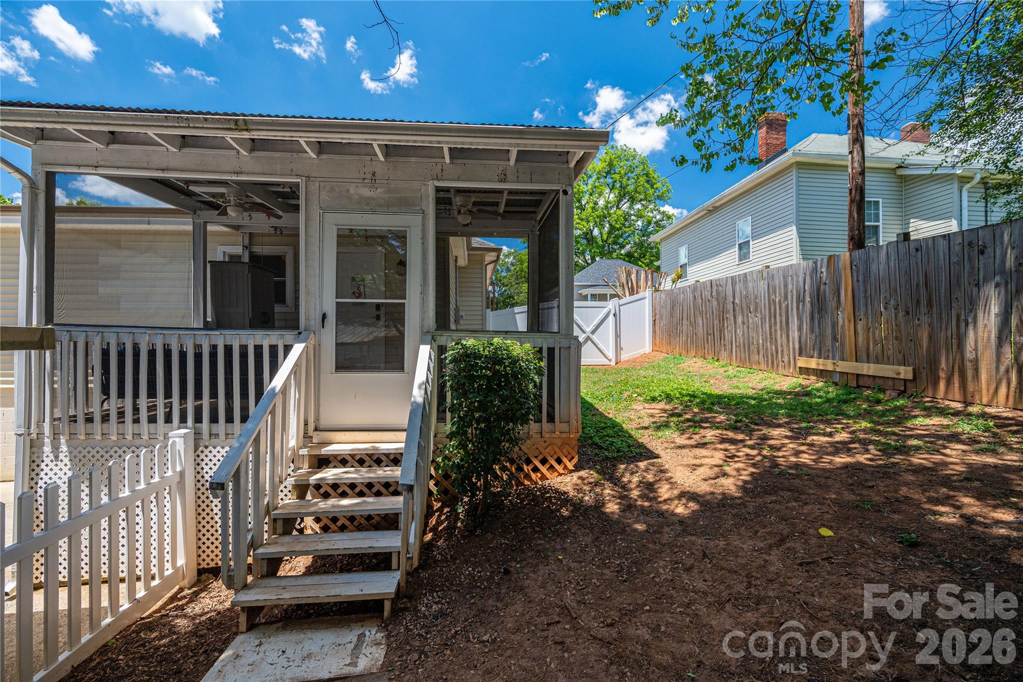58 Fourth Street Cramerton, NC 28032 - Photo 39 of 44 a front view of a house with a porch
