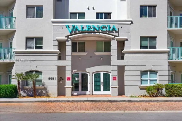 a front view of multi story residential apartment building