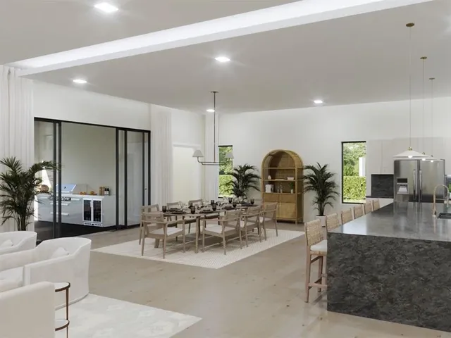 a view of a living room and dining room