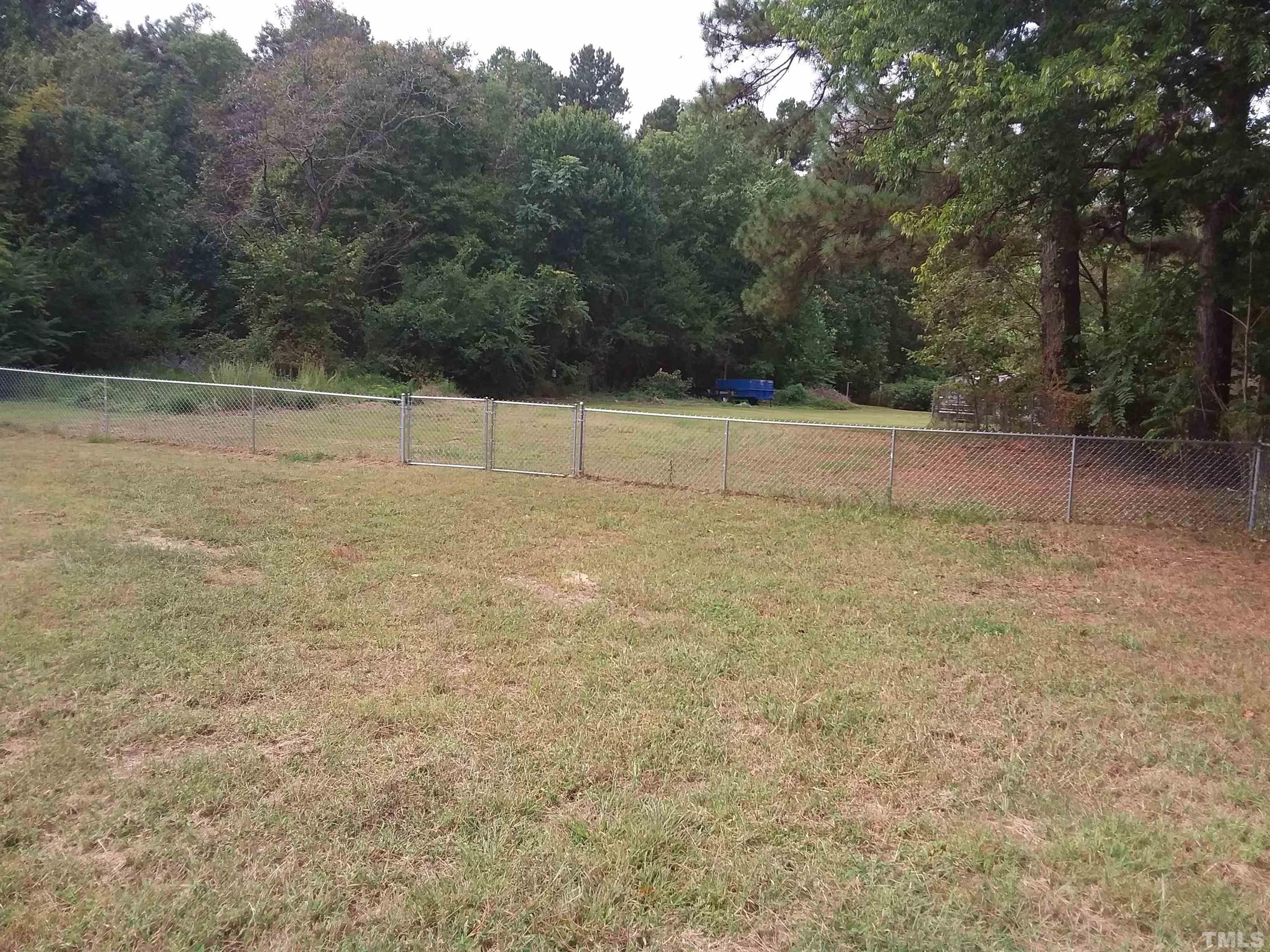 6504 Rock Quarry Road Raleigh, NC 27610 - Photo 5 of 13 lot behind fenced area