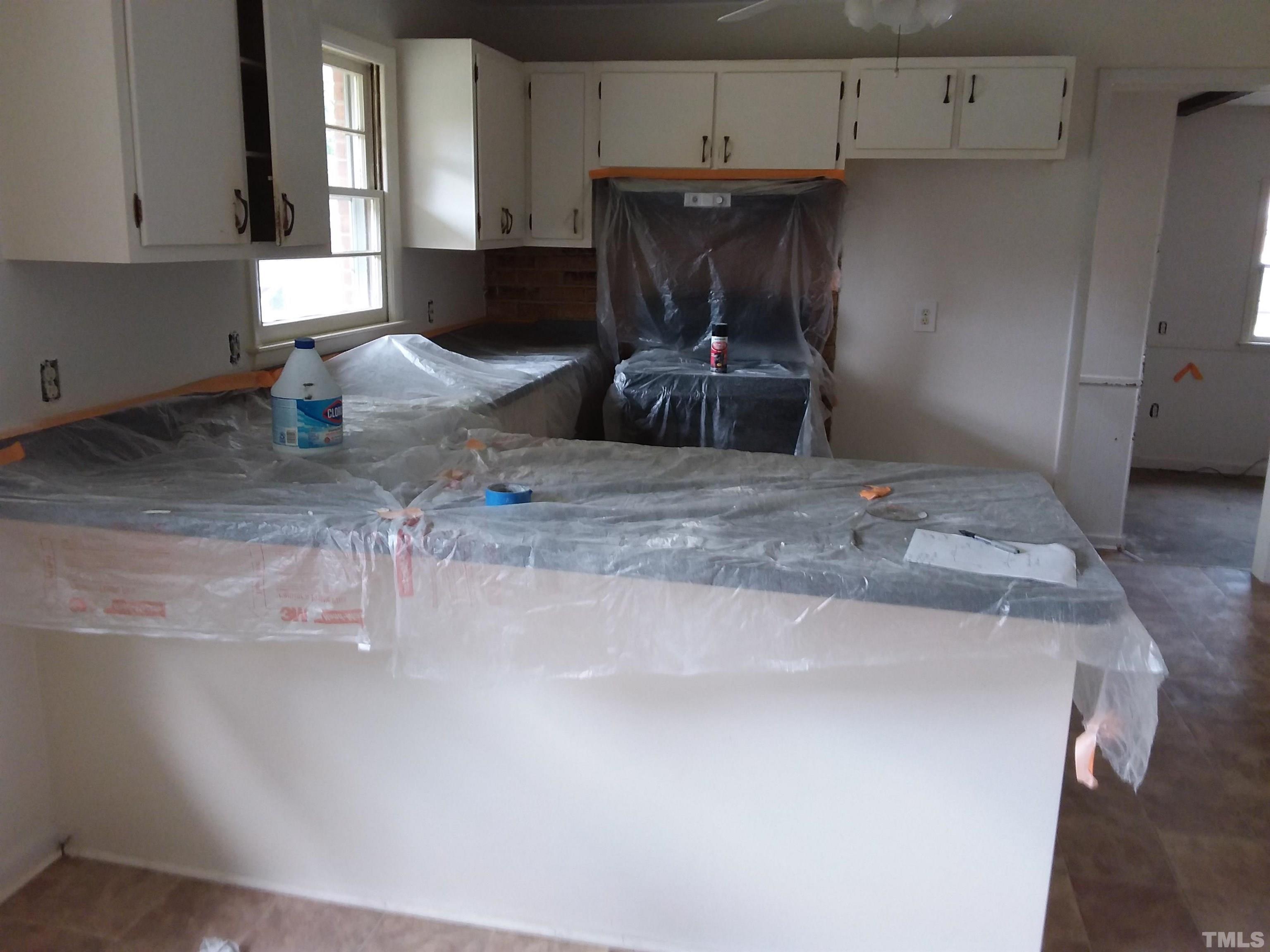 6504 Rock Quarry Road Raleigh, NC 27610 - Photo 8 of 13 kitchen getting new paint also