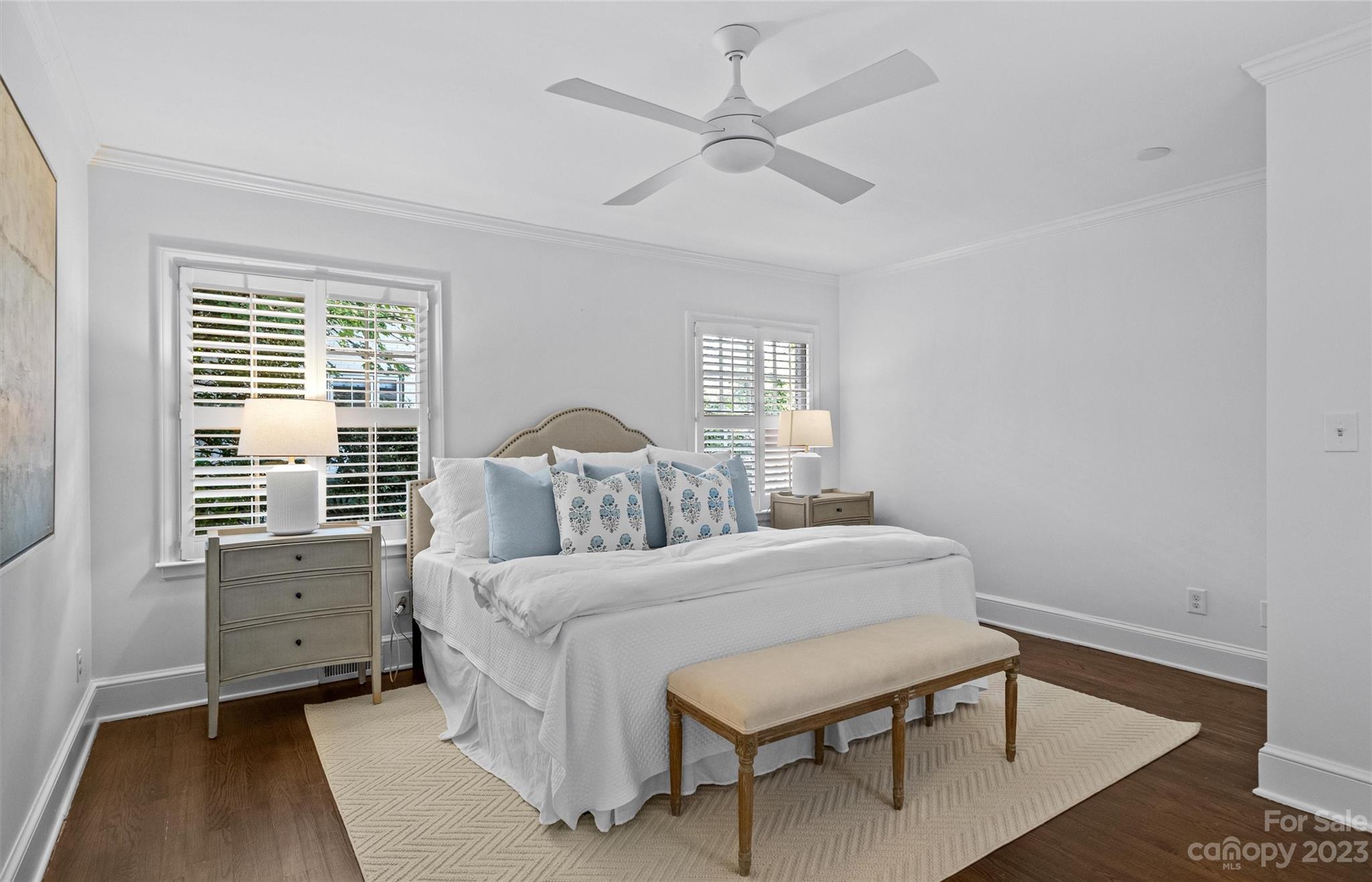 1550 Coventry Road Charlotte, NC 28211 - Photo 18 of 31 a bedroom with a bed a table and a dresser