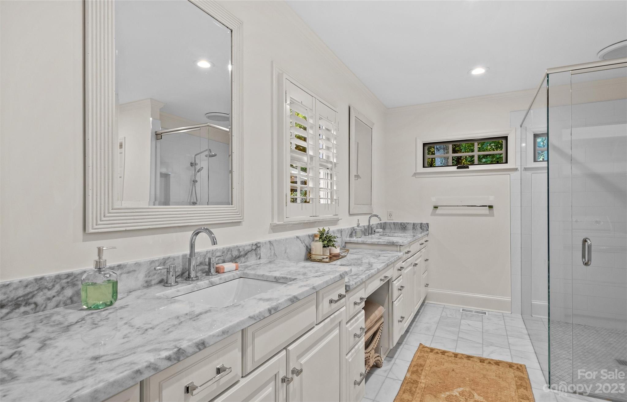 1550 Coventry Road Charlotte, NC 28211 - Photo 20 of 31 a bathroom with a granite countertop sink and a mirror