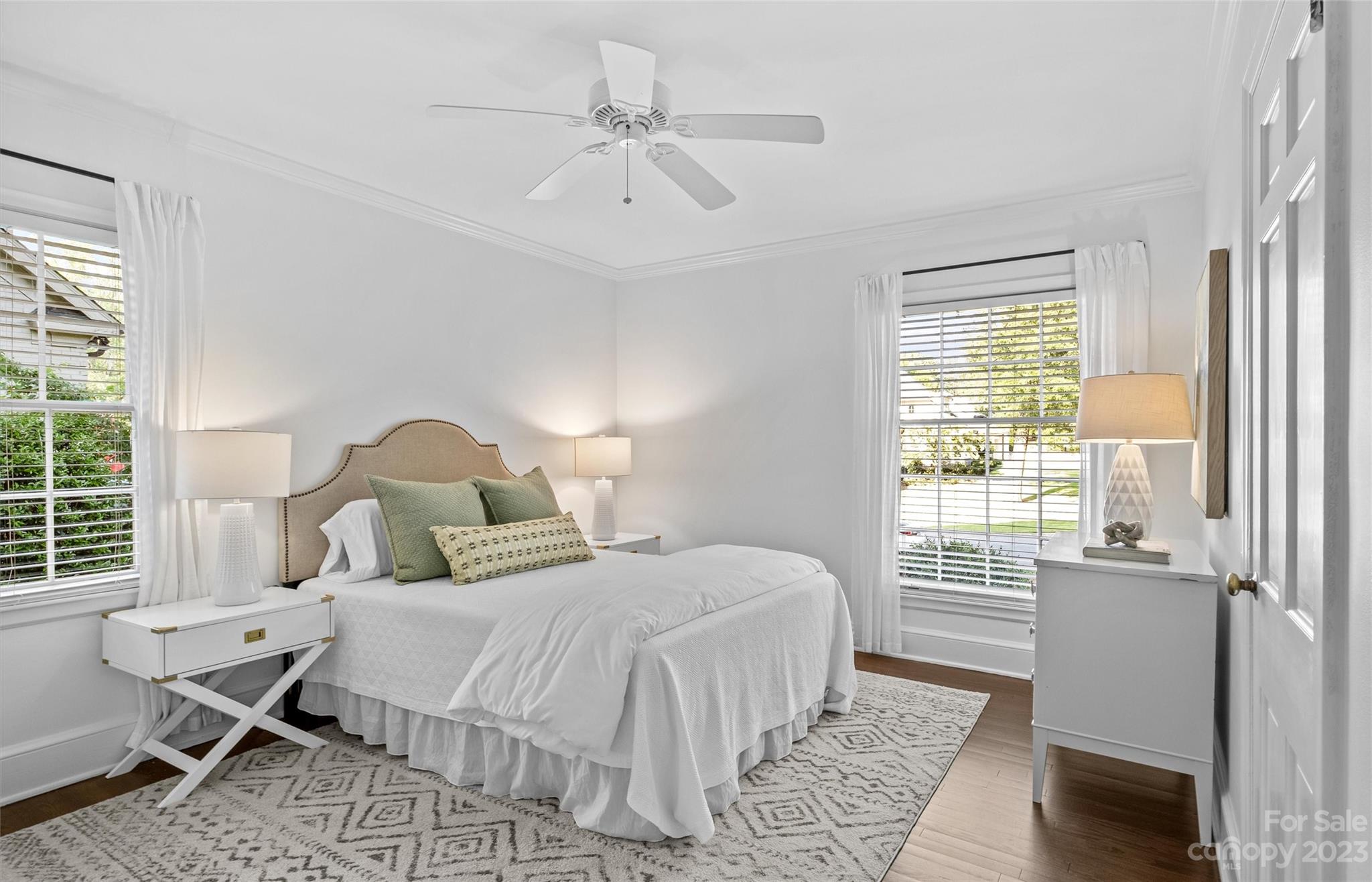 1550 Coventry Road Charlotte, NC 28211 - Photo 22 of 31 a bedroom with a bed and wooden floor