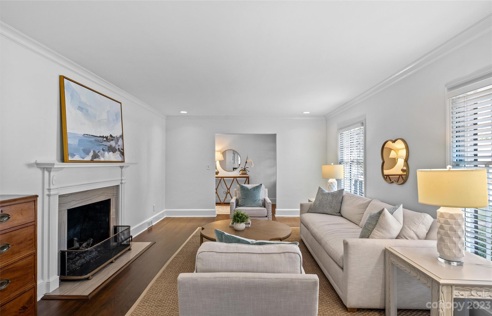 1550 Coventry Road Charlotte, NC 28211 - Photo 4 of 31 a living room with furniture and a fireplace
