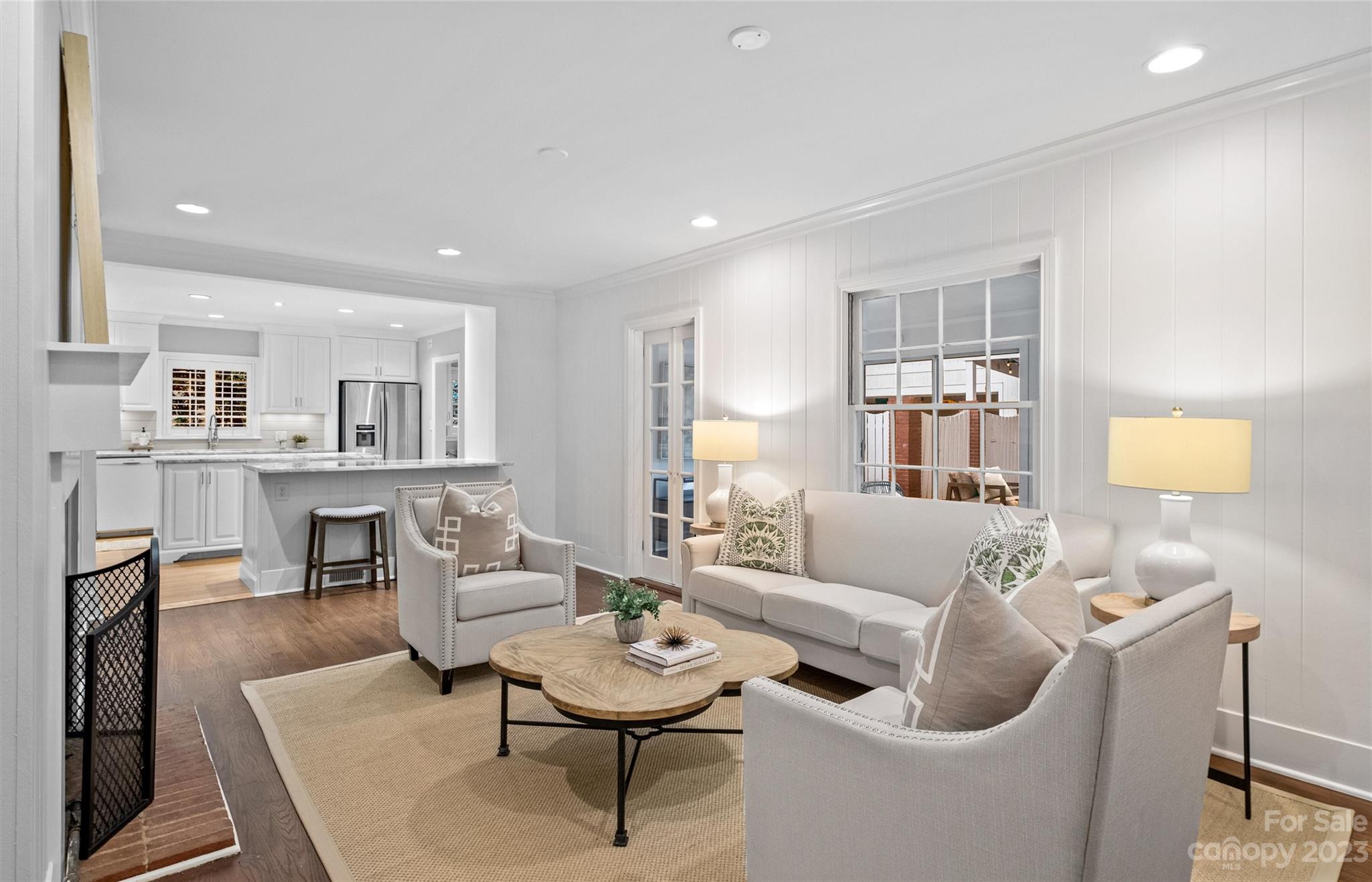 1550 Coventry Road Charlotte, NC 28211 - Photo 6 of 31 a living room with furniture and a wooden floor
