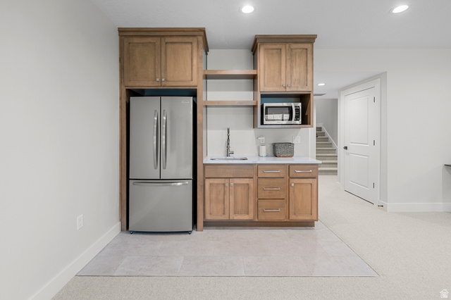 250 South Main Street, Unit 24 Alpine, UT 84004 - Photo 35 of 50 Kitchen featuring stainless steel appliances, wood finish cabinets, open shelves, recessed lighting, and light tile patterned floors