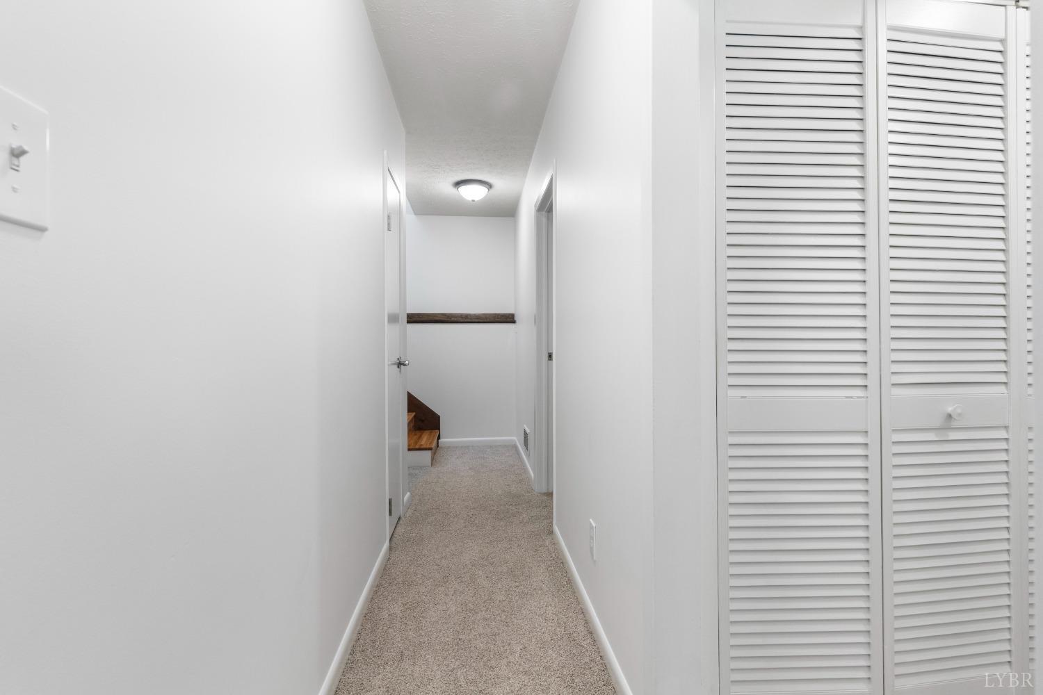 594 Viewmont Drive Evington, VA 24550 - Photo 23 of 43 a view of a hallway with a white walls