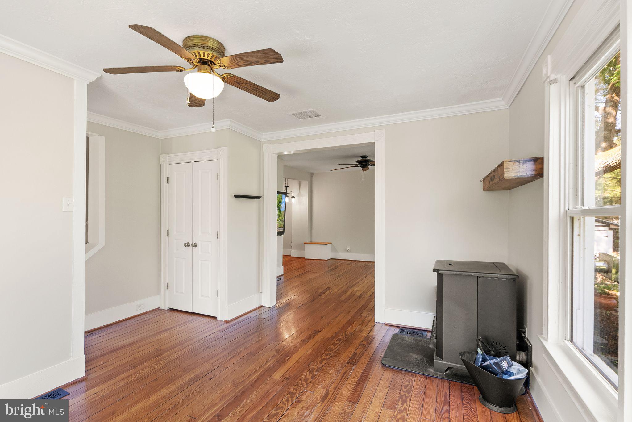 37151 Branchriver Road Purcellville, VA 20132 - Photo 14 of 63 a view of a workspace with wooden floor and a window