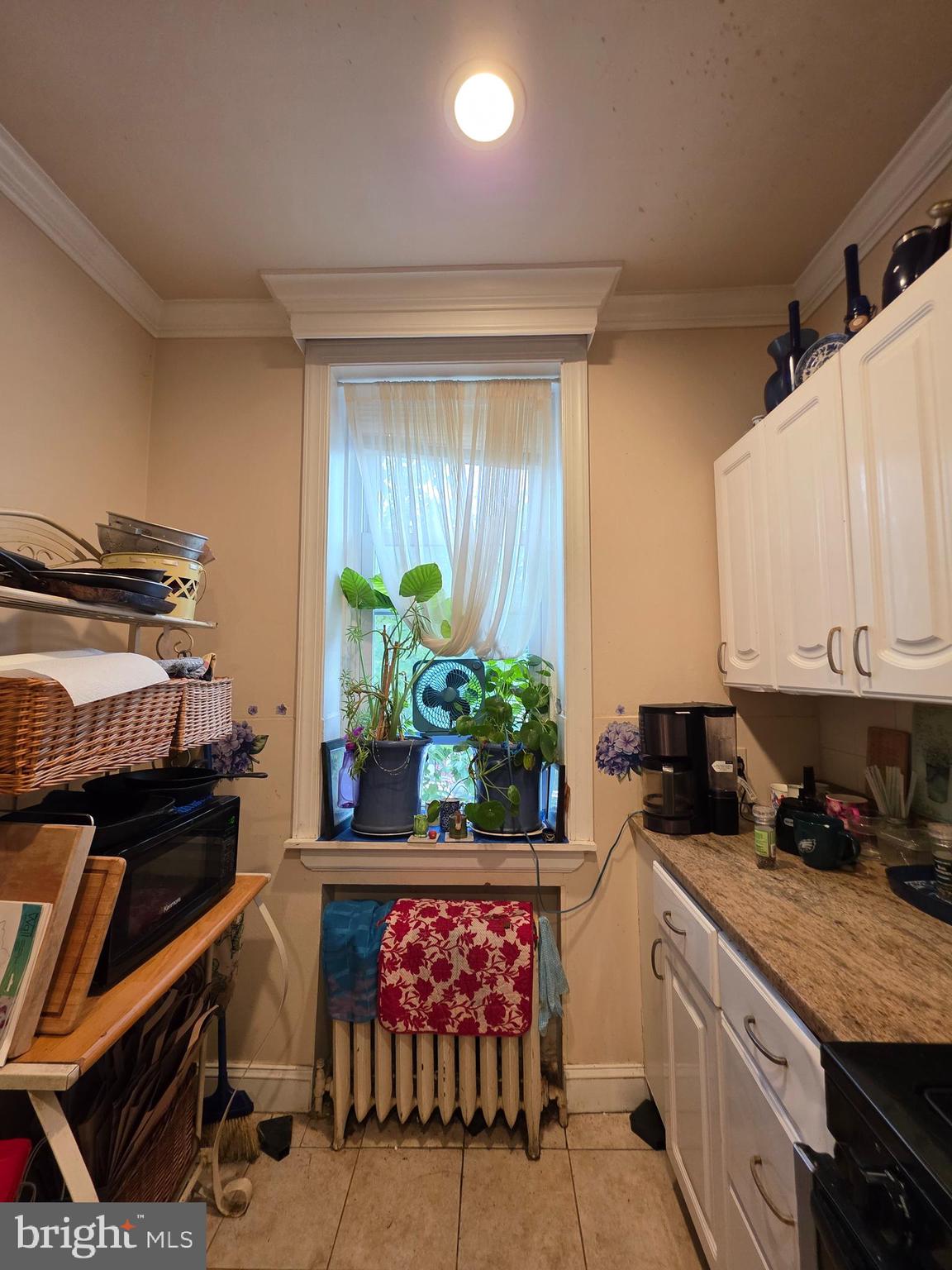 20 South Orange Street Media, PA 19063 - Photo 12 of 18 a kitchen with stainless steel appliances granite countertop a stove a sink and a cabinets