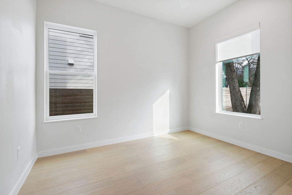 2912 East 13th Street Austin, TX 78702 - Photo 17 of 40 an empty room with a window