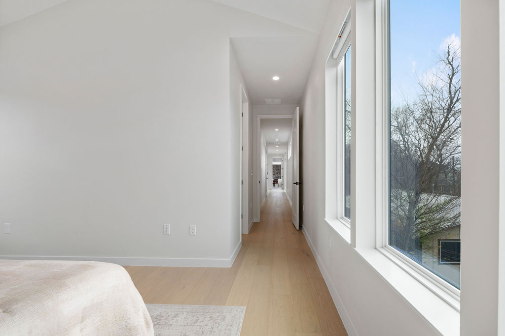 2912 East 13th Street Austin, TX 78702 - Photo 31 of 40 a view of a bathroom with a bathtub and shower