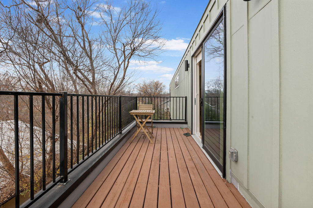 2912 East 13th Street Austin, TX 78702 - Photo 33 of 40 a view of balcony with wooden floor and wooden floor
