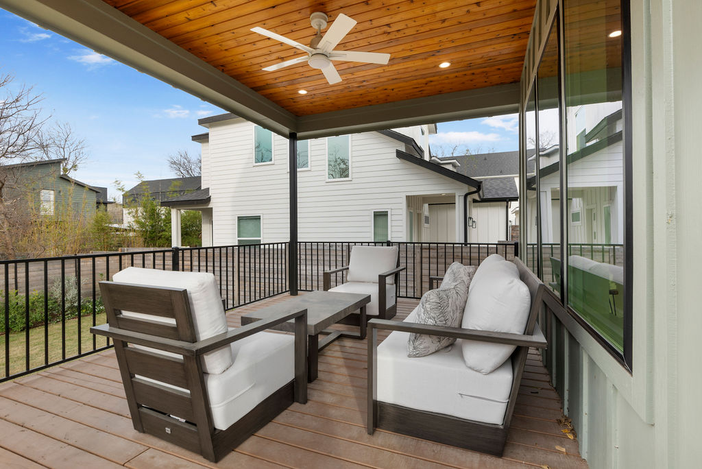 2912 East 13th Street Austin, TX 78702 - Photo 36 of 40 a roof deck with couches and wooden floor