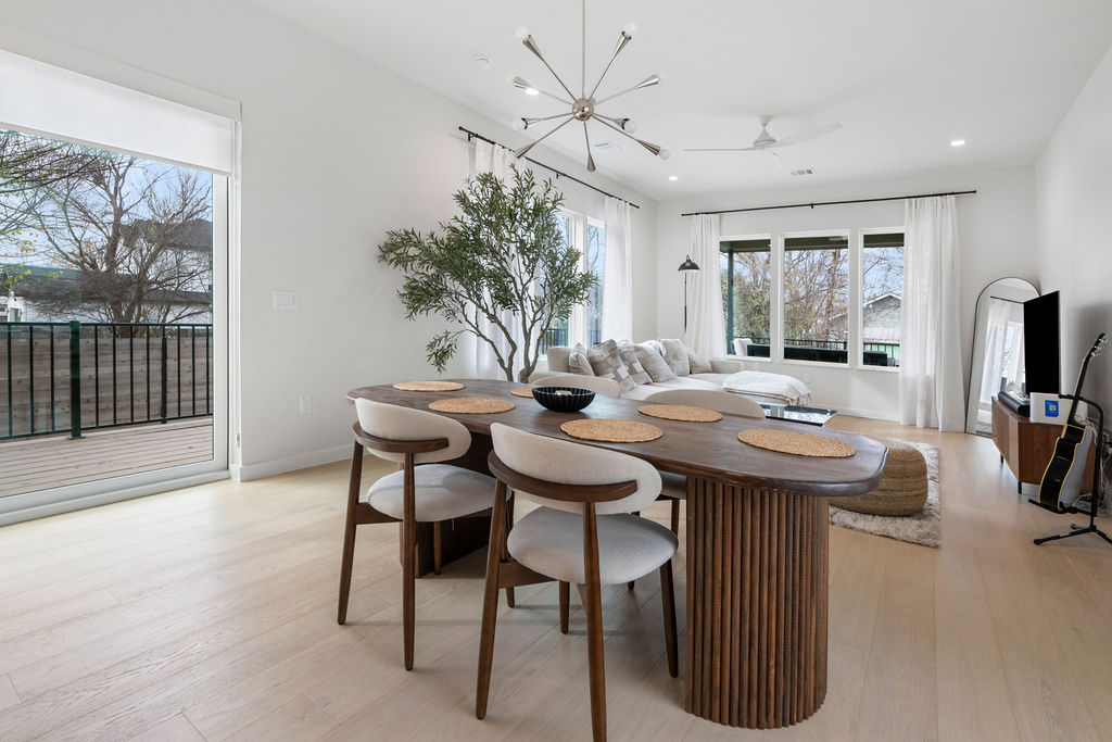 2912 East 13th Street Austin, TX 78702 - Photo 4 of 40 a view of a dining room with furniture window and outside view