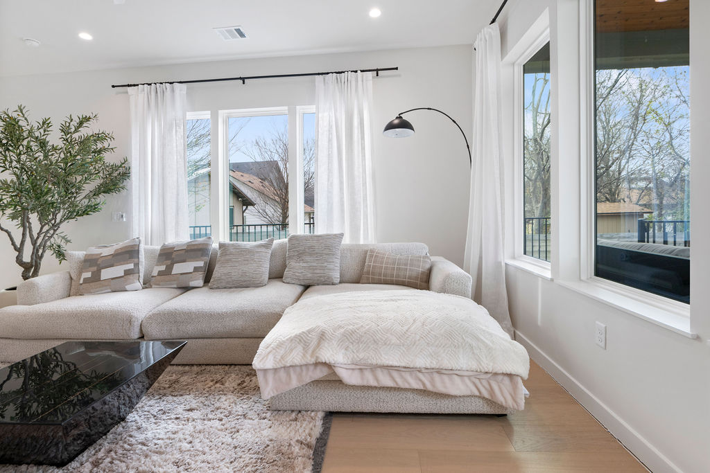 2912 East 13th Street Austin, TX 78702 - Photo 6 of 40 a living room with furniture and a large window