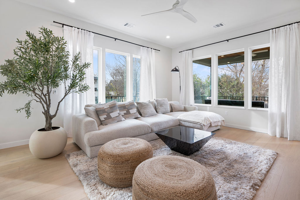 2912 East 13th Street Austin, TX 78702 - Photo 8 of 40 a living room with furniture and a large window