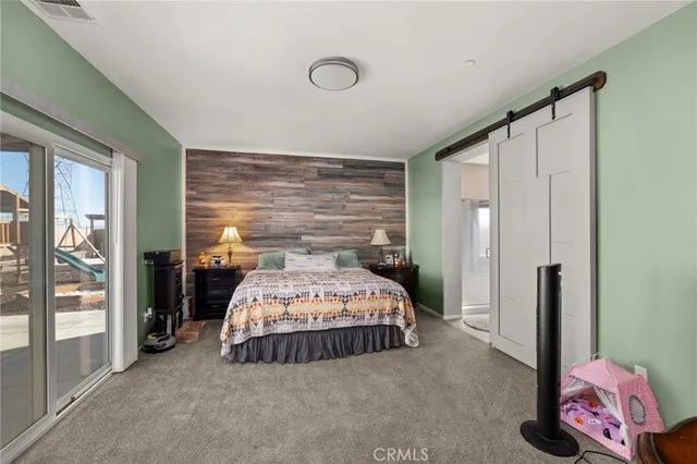 a bathroom with a tub sink mirror and shower