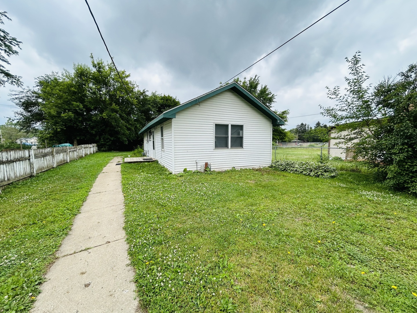 37706 North Nippersink Place Spring Grove, IL 60081 - Photo 15 of 18 a view of backyard of house with green space