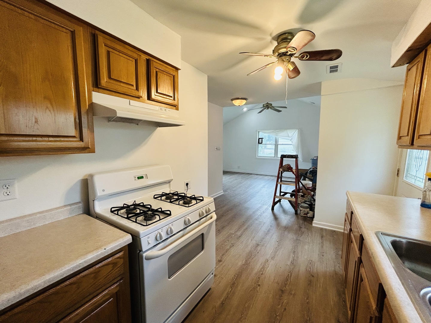 37706 North Nippersink Place Spring Grove, IL 60081 - Photo 7 of 15 a kitchen with stainless steel appliances a stove a sink and cabinets