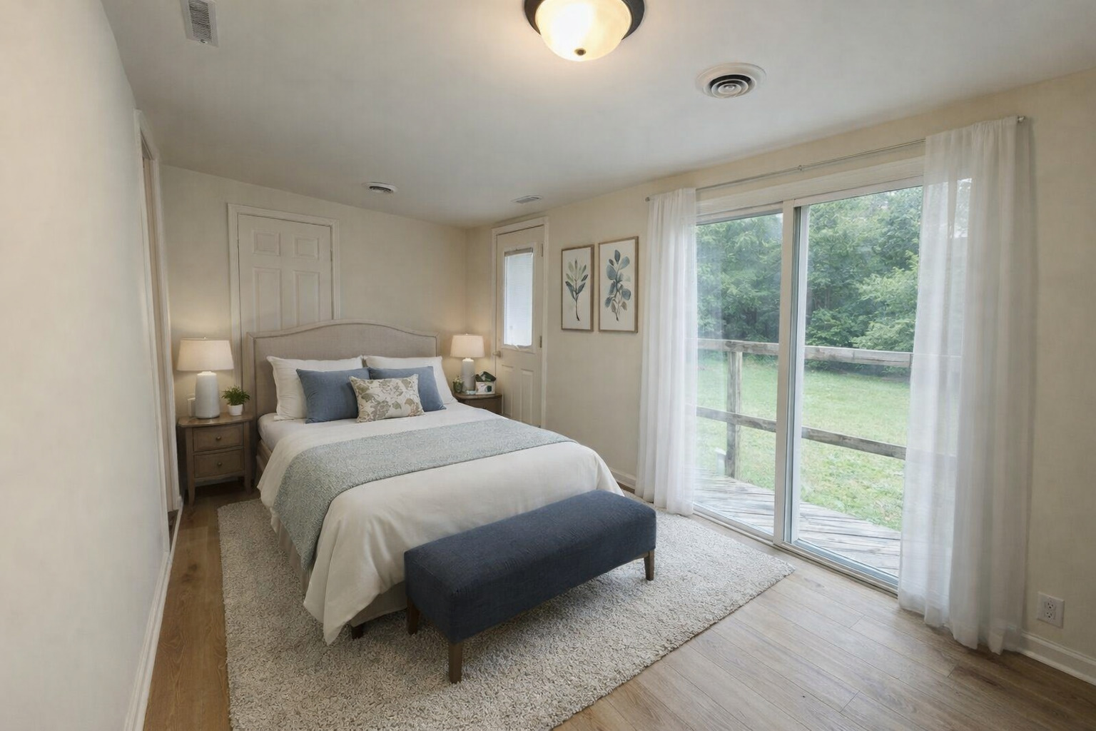 37706 North Nippersink Place Spring Grove, IL 60081 - Photo 8 of 15 a bedroom with a large bed and a large window