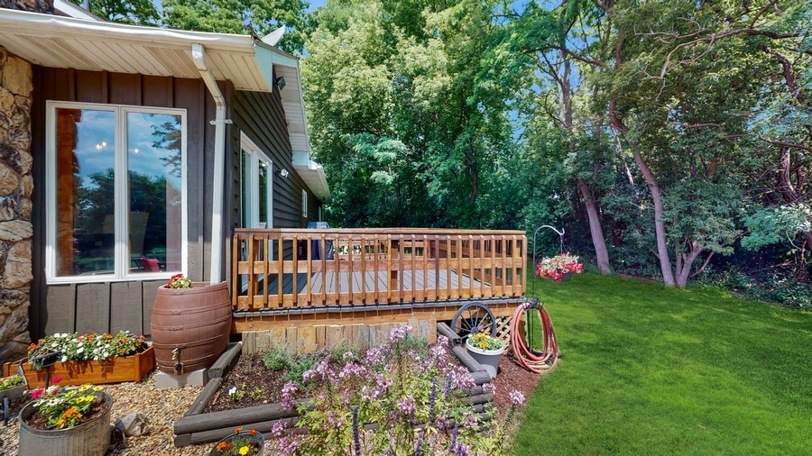 43375 Hunt Club Road Zion, IL 60099 - Photo 20 of 56 a view of a chair and table in the backyard