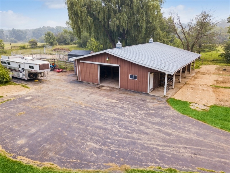 43375 Hunt Club Road Zion, IL 60099 - Photo 26 of 56 a backyard of a house with yard and outdoor seating