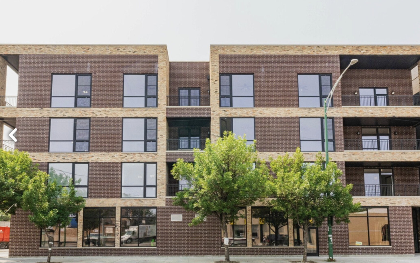 520 North Western Avenue, Unit 4B Chicago, IL 60612 - Photo 1 of 35 front view of building with a tree