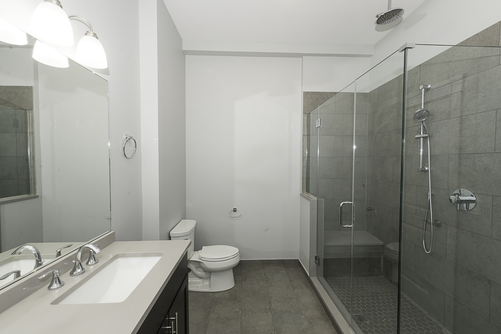 520 North Western Avenue, Unit 4B Chicago, IL 60612 - Photo 13 of 35 a bathroom with a sink and a mirror